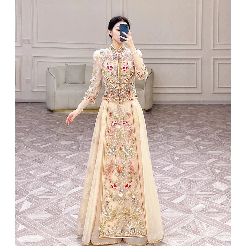 

Новое китайское свадебное платье цвета шампанского золотого тяжелого промышленности для тостов.