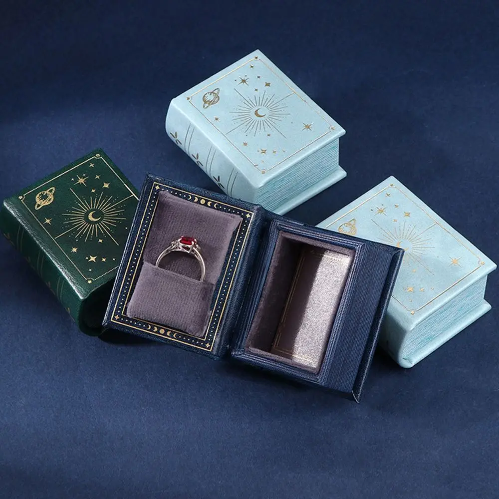 Caixa de anel de couro pu de alta qualidade, suporte de anel retrô em forma de livro, tampa flip, caixa de armazenamento de presente de joias