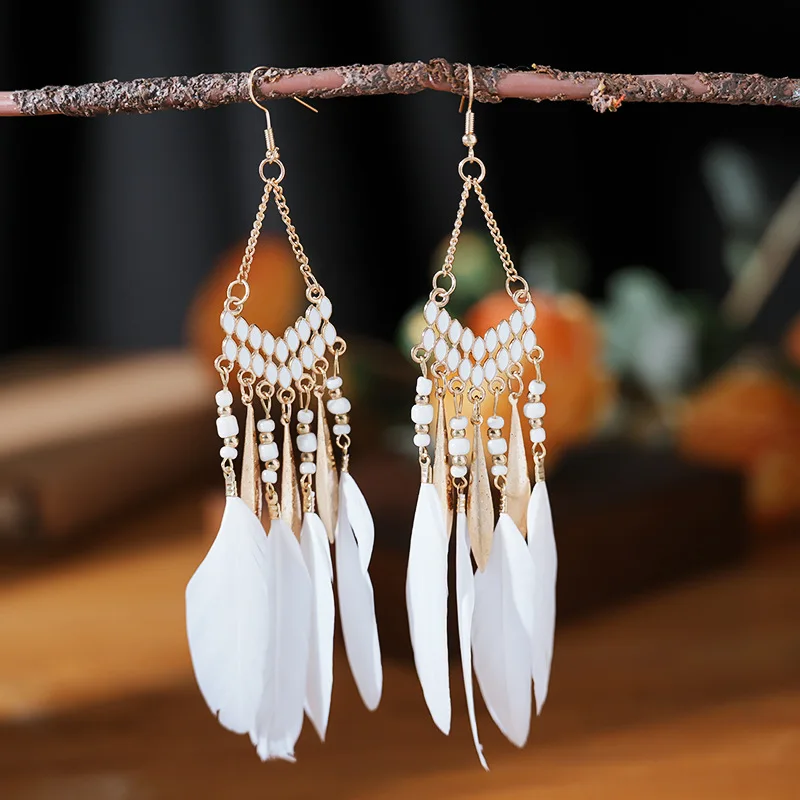 Boucles d'oreilles pendantes bohèmes ethniques pour femmes, pendentifs en plumes, perles colorées, pompons longs, bijoux bohèmes pour filles