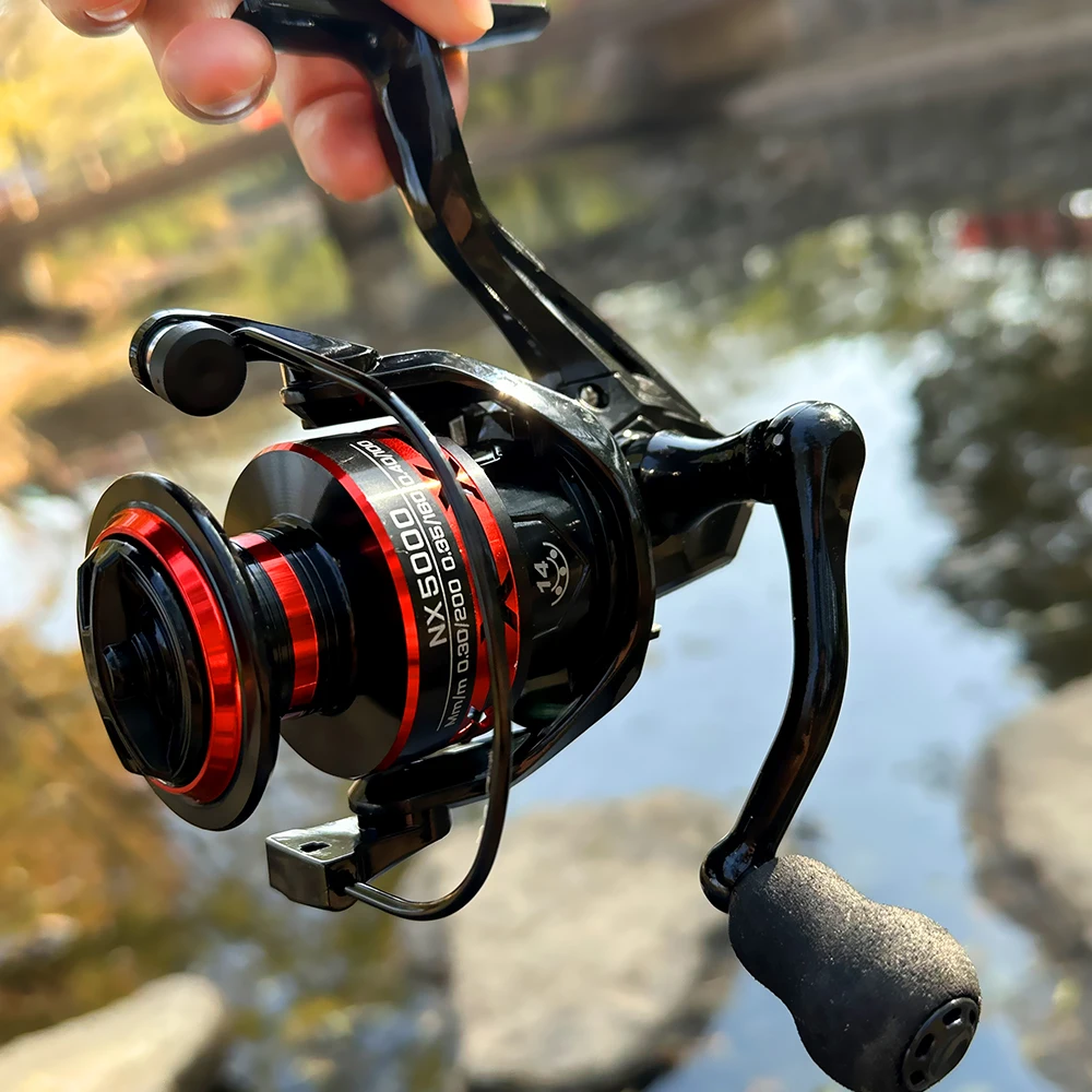 Carrete de pesca ligero para mar con giro suave y bobina metálica - imagen 4