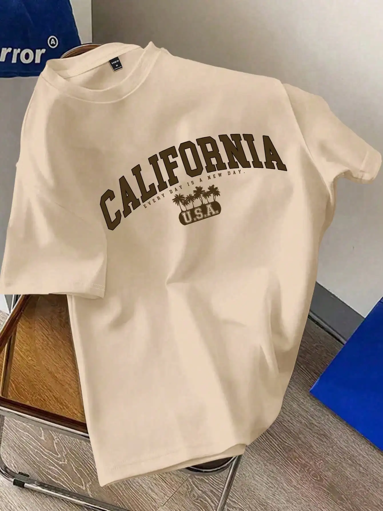 Beige Casual Round Neck Short Sleeve T-Shirt with Arch Print and Palm Tree Graphic