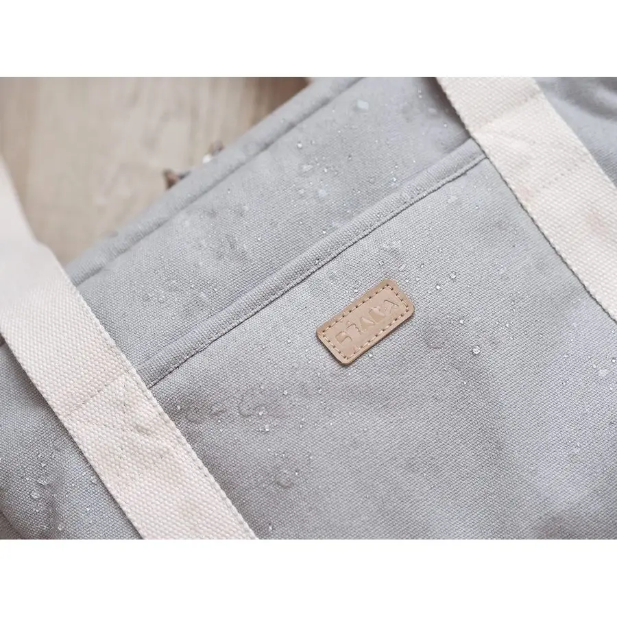 Bolsa de fraldas Paris de grande capacidade com alça para carrinho de bebê deve ter