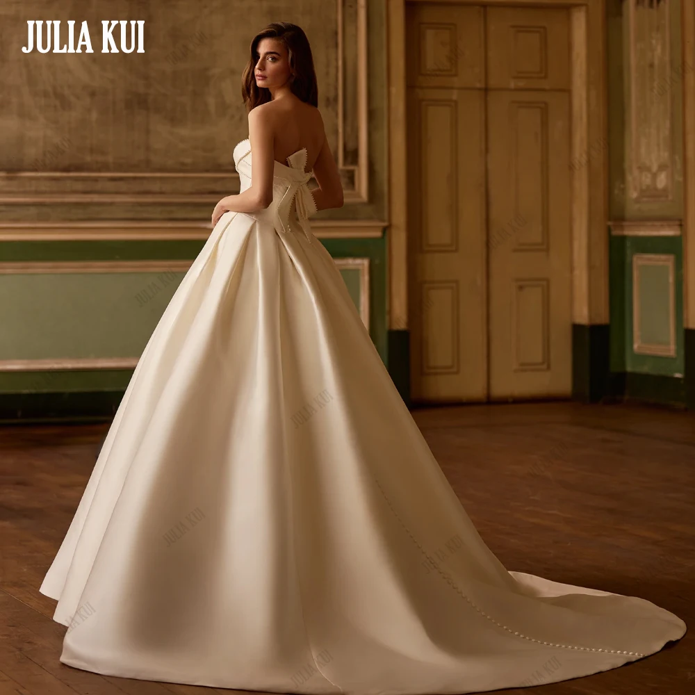 

Julia Kui Luxury Satin Beaded Pearls Pleat Sweetheat Wedding Dress Sleeveless With Bow A-Line Bridal Gowns