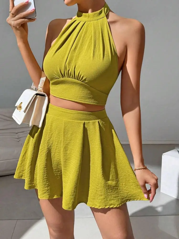 

Летний комплект из двух предметов, женские желтые сексуальные короткие топы с открытыми плечами и лямкой на шее + плиссированные шорты с высокой талией, юбка, тренд уличной одежды