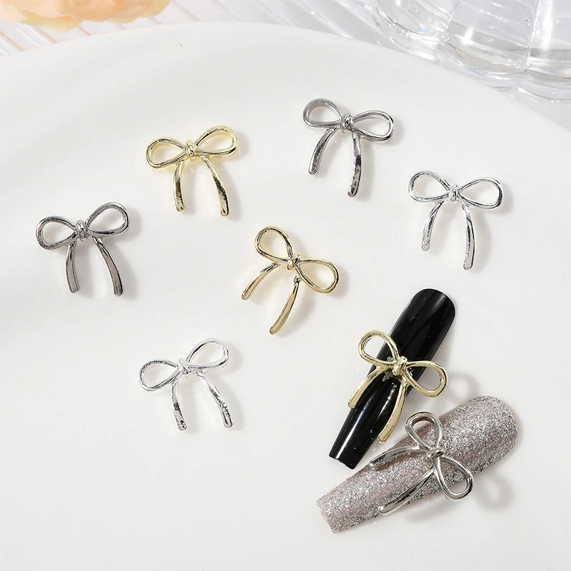 10 pezzi oro argento fiori accessori per Manicure strass per unghie gioielli per Nail Art decorazioni per unghie con fiocco trapani per Nail Art 3D