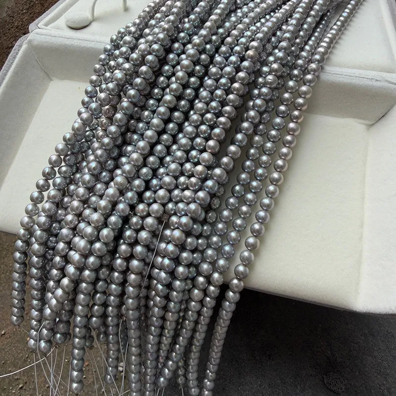 5-6mm nearly circular irradiated gray freshwater DIY semi-finished products, approximately 39 cm in length, about 70 pieces.
