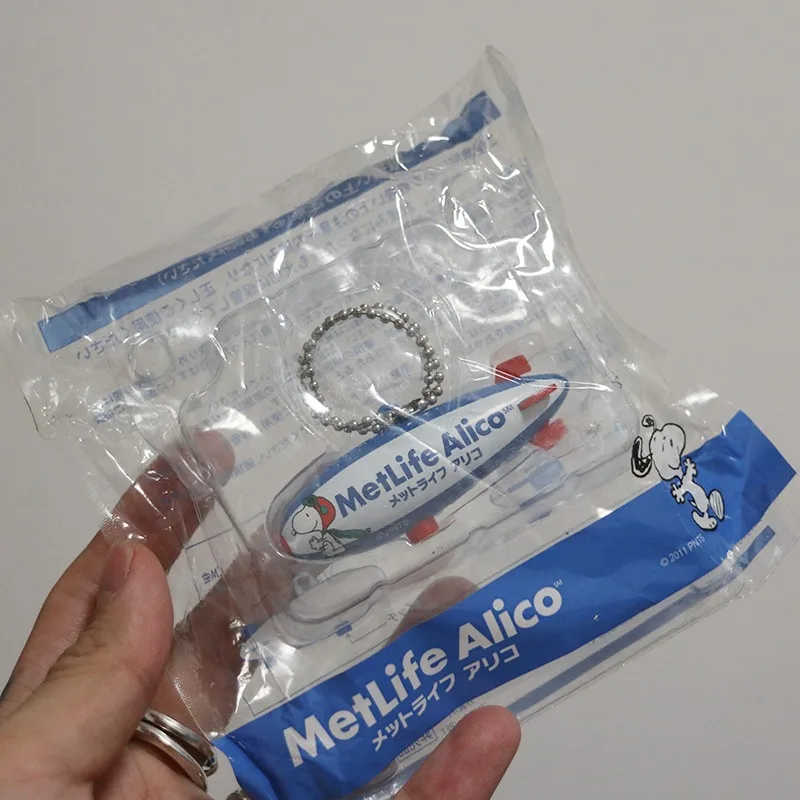 Figura Snoppy, muñeco de perro blanco, modelo de avión, bolso, llavero colgante, juguete de colección para niños