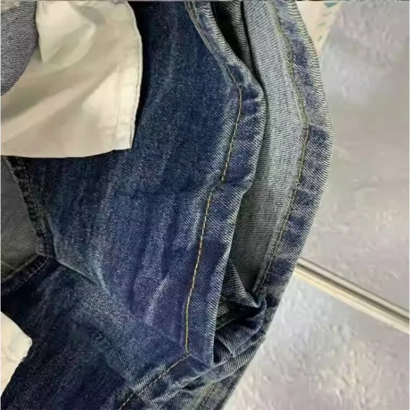 夏の新デニムスカート女性の 2025 レトロオールドハイウエスト一言抗光ミニスカート