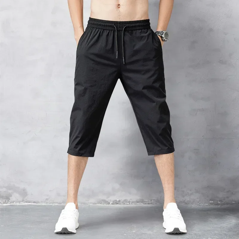 Pantalones cortos de verano para hombre, Bermudas de nailon fino de 2024 de longitud, secado rápido, color negro, 3/4