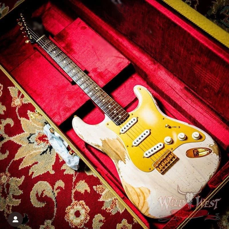 Aged Stratocaster style electric guitar ashwood body rosewood neck and fingerboard aluminium gold pickguard relic paint and aged