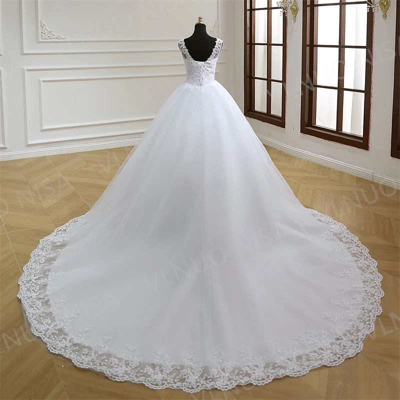 Mode klassische Luxus Spitze V-Ausschnitt Ballkleid weiß Brautkleider ärmellose Prinzessin Illusion Applikationen Brautkleid Casamento