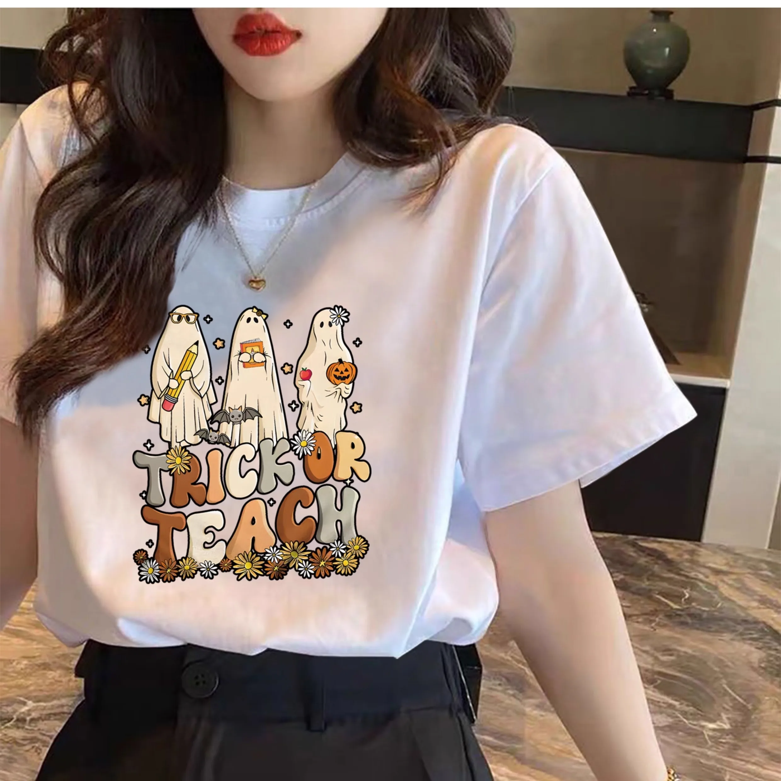 เสื้อยืดฮาโลวีน 2025 แฟชั่นใหม่ ขายดี เสื้อแขนสั้นลำลอง สตรีทแวร์ ลายผี เสื้อยืดคอตตอน คอกลม