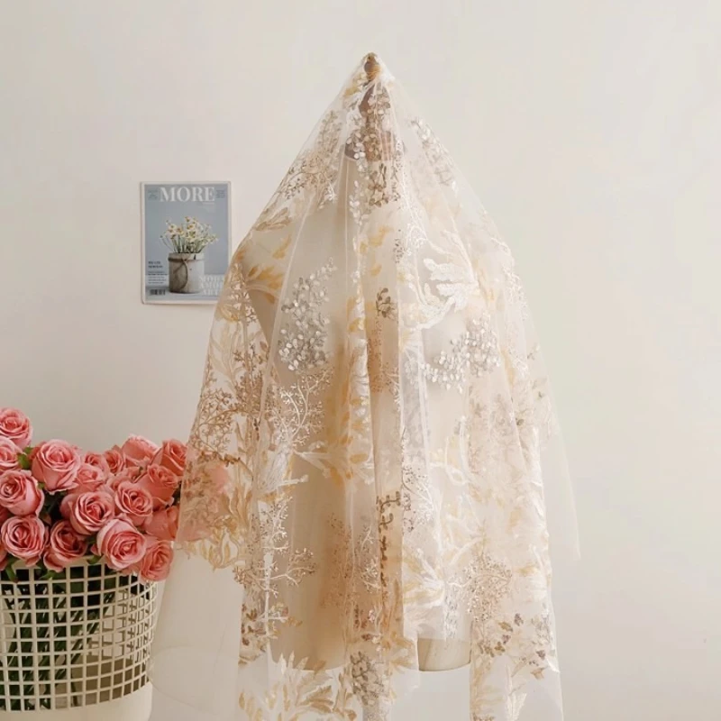 

Абрикосовая вышитая блестками сетчатая ткань для свадебных платьев и вечерних платьев Дизайнерская ткань во дворе