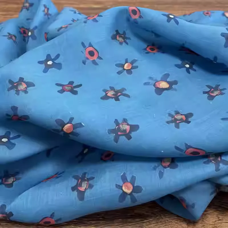 

High quality pure ramie fabric with blue printing, suitable for summer shirts, dresses, and hand sewn fabrics.