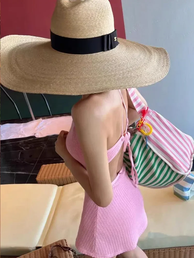 Traje de baño de una pieza con falda sin espalda y sin mangas de punto de Corea del Sur para mujer, nuevo traje de baño de vacaciones adelgazante para cubrir el vientre de verano 2025