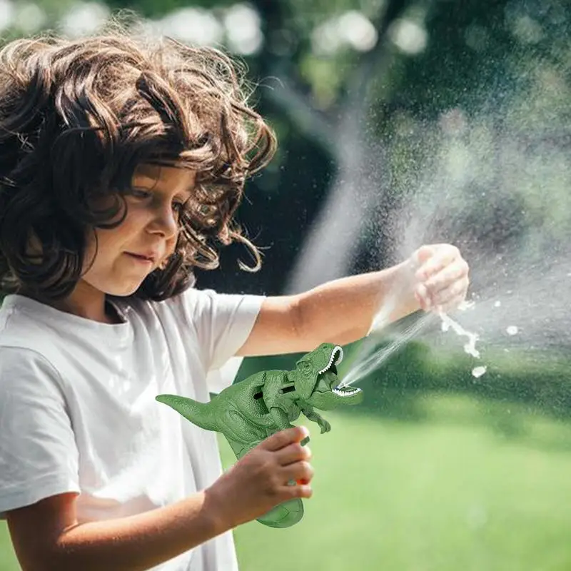 Pistol air dinosaurus lucu kepala berputar semprotan dinosaurus untuk anak-anak mainan kolam Musim Panas pistol air taman Dino menembak