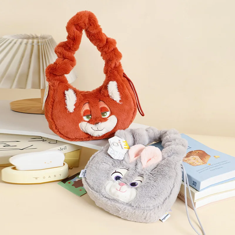 

Набор: плюшевая кукла Джуди Хоппс из Диснеевского фильма «Зверополис» и сумка через плечо Ник Уайлд — сумка через плечо в виде лисы с мягкой игрушкой внутри.