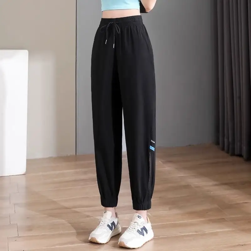 2024 Summer New Women's Solid Color Elastic High Waist Drawstring Spliced Loose Gauze Hollow Out Casual All-match Sports Pants