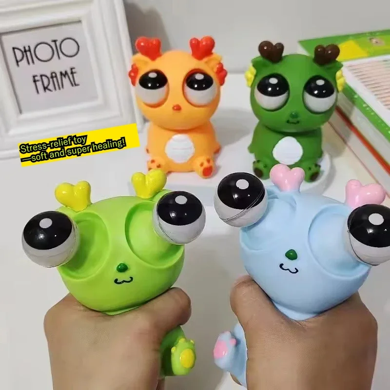 Juguete de décompression de dinosaure dragón, ojo explosivo creativo, exprimidor de alegria, ojo de mirar, liberación divertida
