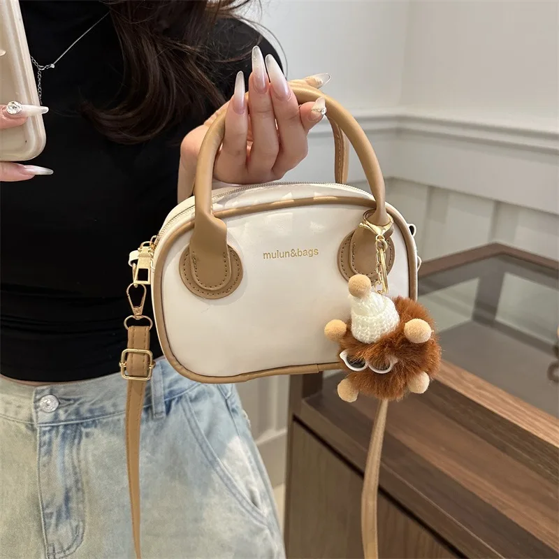 Modische Handtasche mit Textur-Spleiß, Frühling, neue vielseitige Umhängetasche, kleine quadratische Tasche für Damen