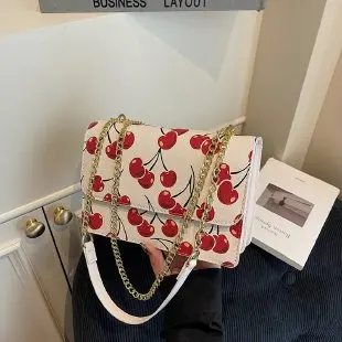 

25. Новая модная брендовая сумка через плечо с вишневым узором Taby Dionysian, портативная сумка через плечо с цепочкой, сумка через плечо с ароматом Джокера