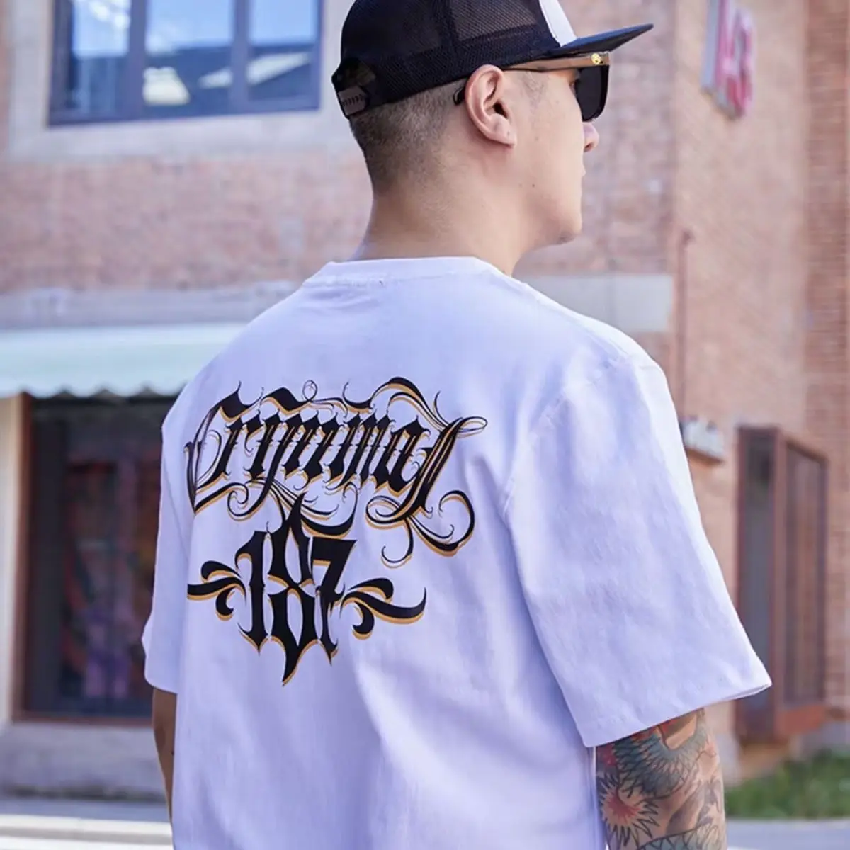 2026 الاتجاه الصيف قصيرة الأكمام طاقم الرقبة تي شيرت الأمريكية المطبوعة الرجال والنساء القطن عادية شارع العليا فضفاض ريترو