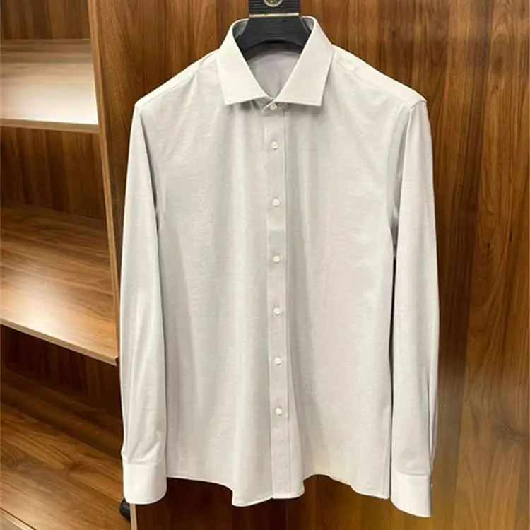 

Итальянская роскошная и удобная осенне-зимняя универсальная деловая повседневная облегающая рубашка с длинными рукавами и лацканами