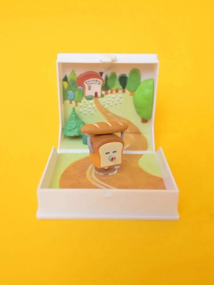 Miniaturowa scena z książką obrazkową: Złodziej chleba ucieka z świata książek, dekoracja na biurko, modna zabawka, kolekcjonerski blind box.