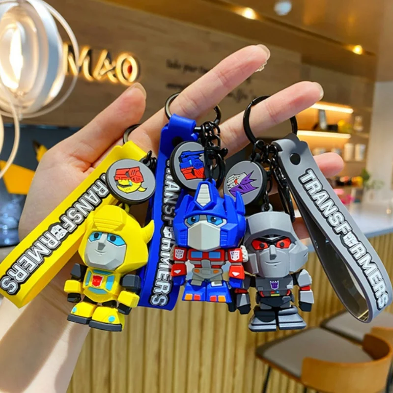 Nuovi Transformers Periferico Optimus Prime Megatron Bumblebee 3d Cartoon Car Portachiavi Zaino Ciondolo Zaino Decorazione Regalo