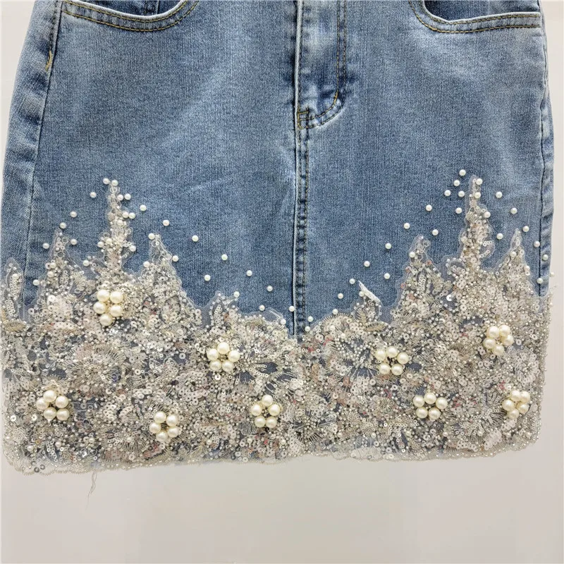 2024 Sommer neue Schwerindustrie Perlen Scheiden rock Frauen Mode Blume bestickt Stretch abnehmen hohe Taille Jeans rock