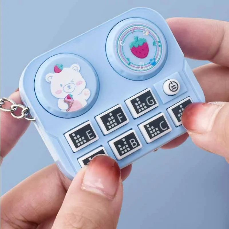 Porte-clés pendentif de lecteur de disque de musique de dessin animé créatif, mini machine de jeu électronique émettant de la lumière, jouets pour enfants