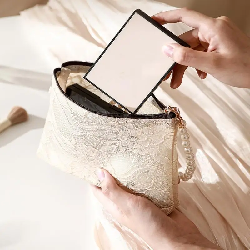 Kosmetiktasche aus Spitze mit Perlen-Handgelenkschlaufe und halbtransparentem Design, perfekt für die Aufbewahrung des täglichen Make-ups und für den Reisegebrauch. – Detail 12