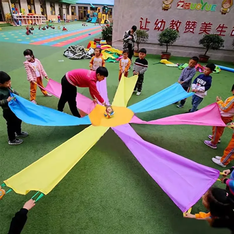 Juego al aire libre, juguete de paracaídas, paraguas octogonal de arcoíris, deportes sensoriales, equipo cooperativo, edificio, Kinder Spiele, Juguetes Divertidos