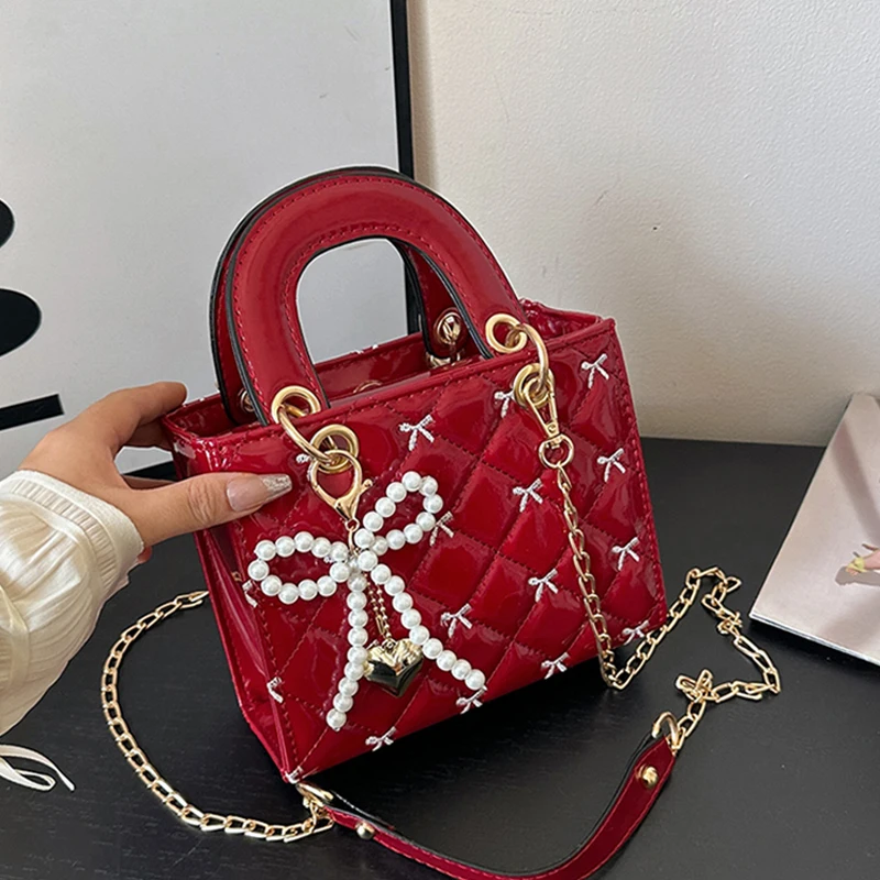 

Женская банкетная сумка из блестящей лакированной кожи с бантом на одно плечо, сумка через плечо, роскошный свадебный маленький клатч с подвеской