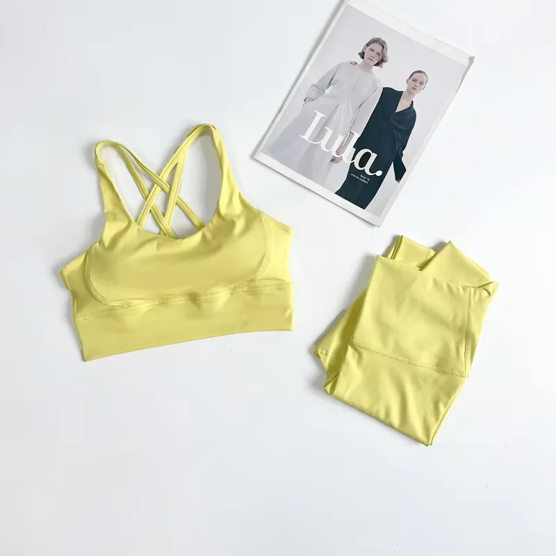 ชุดโยคะ 2 ชิ้น ชุดออกกำลังกายสำหรับผู้หญิง ชุดกีฬา เสื้อผ้าออกกำลังกาย กางเกงเลกกิ้งเอวสูง สายไขว้ บราฟิตเนส ชุดวิ่ง 👚 👍️