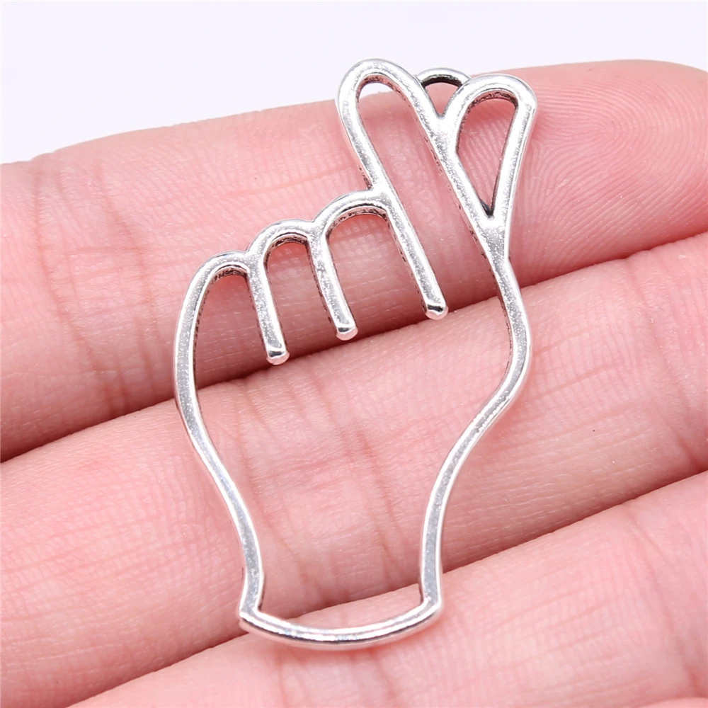 

Wholesale 100pcs/bag 42x29mm Hollow Love Gesture Charms Antique Silver Color For DIY Jewelry Making Charms Jewelry Findings