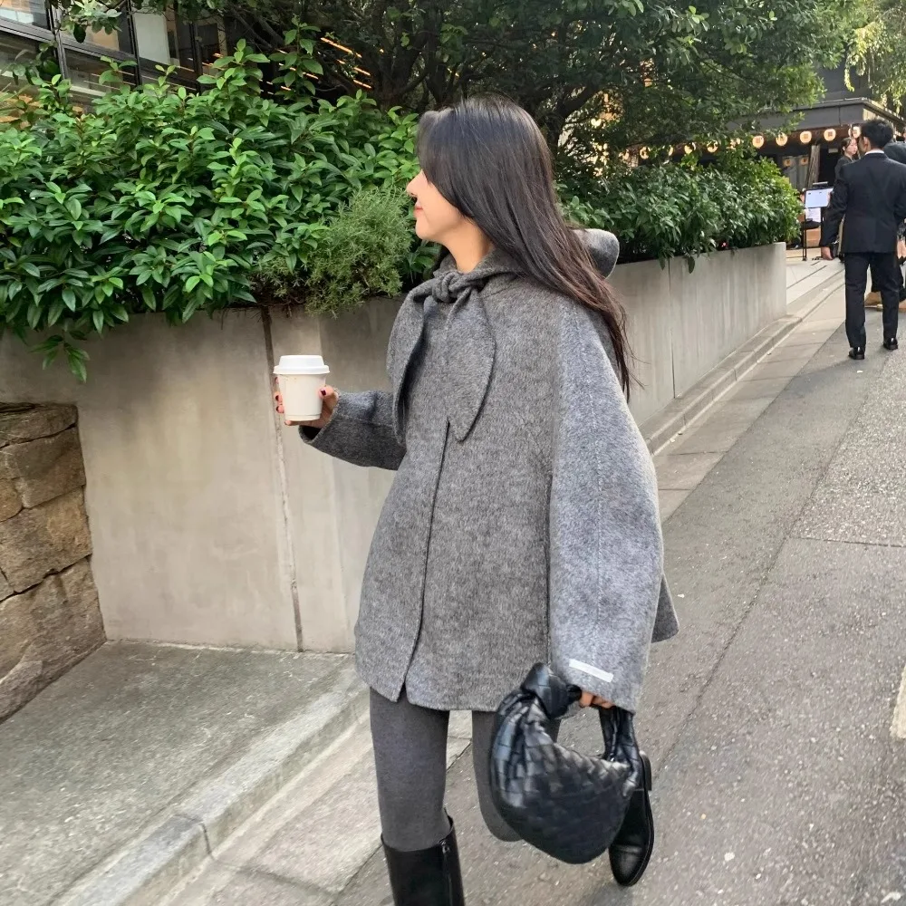 Cappotto di lana coreano con orecchie di coniglio Sle A-Line Capispalla di media lunghezza per le donne Stagione invernale Chiusura lunga con bottone singolo