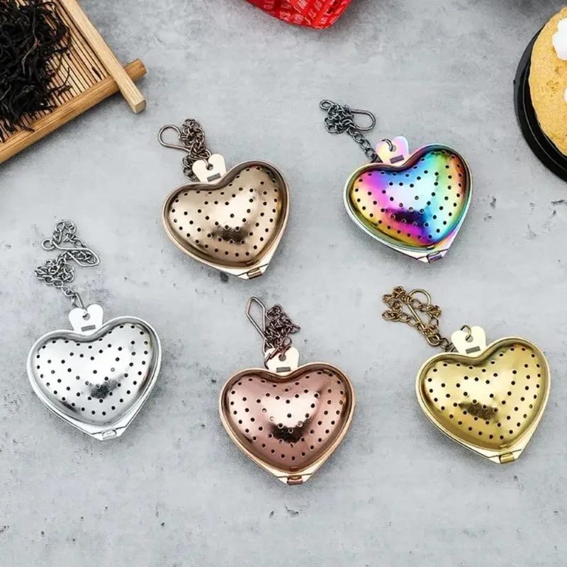 Colino da tè infusore per tè in acciaio inossidabile a forma di cuore che blocca spezie colino per palline da tè filtri per infusore a rete accessori da cucina