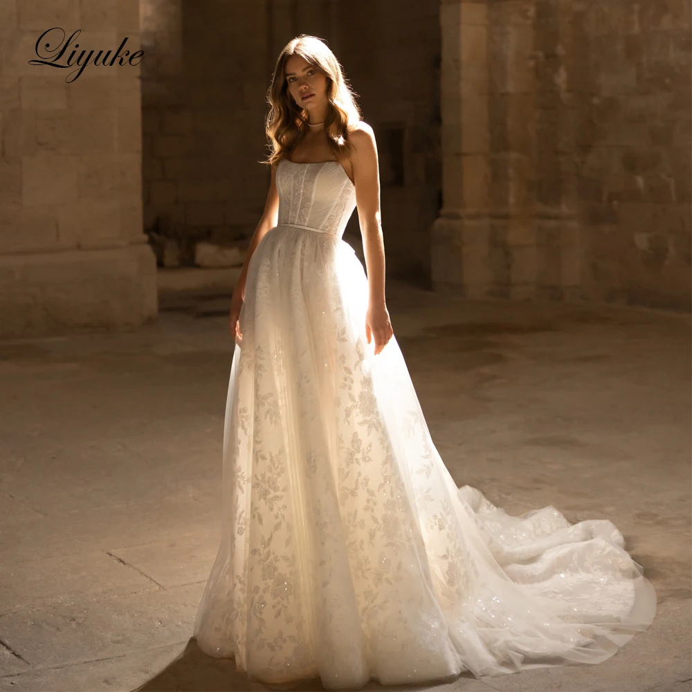 

Liyuke Exquisite A Line Wedding Dresses With Shiny Floral Prints Strapless Elegance Bridal Gowns