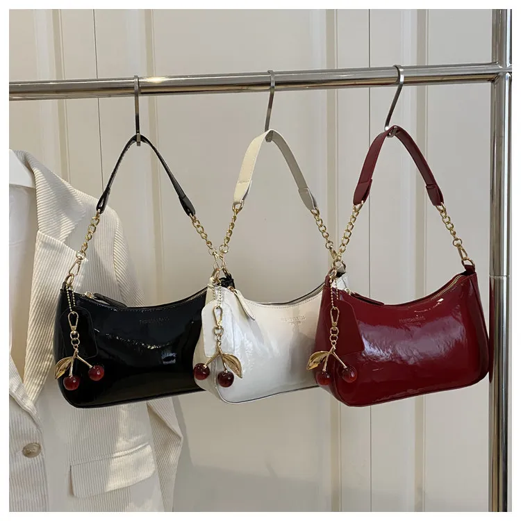 

Premium Texture Commuting Leather Armpit Bag With Cherry Pendant Women's Stylish Fashion Simple Solid Color Crossbody Bag