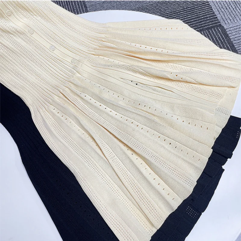 Knitted long skirt black and white contrasting hollow out dress, elegant and fragrant, slim fit women\'s early spring 2024 new