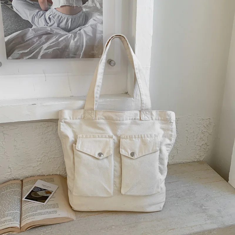 

Женская модная сумка через плечо из холщовой ткани с большой вместимостью и множеством карманов, удобная и универсальная, с текстурной поверхностью, для повседневного использования.