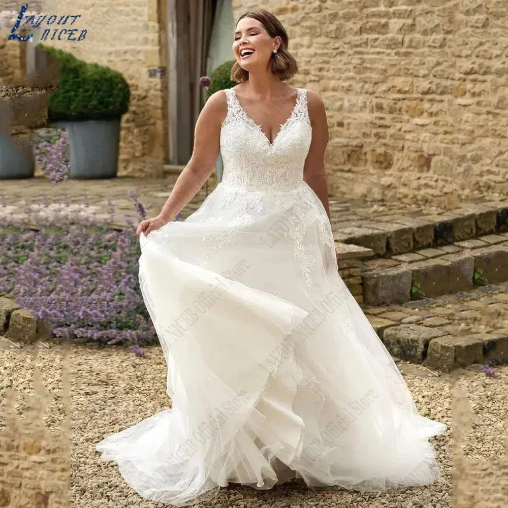 Układ NICEB Plus Size suknie panny młodej bez rękawów z dekoltem w serek aplikacje tiul vestidos de novia suknia ślubna z odkrytymi plecami spersonalizowane Plus Size Suknie panny młodej Bez rękawów V-Neck A-Line Aplik