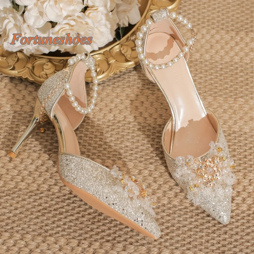 Zapatos de tacón con hebilla de cinturón de una palabra, sandalias huecas con punta estrecha y cadena ostentosa con diamantes de imitación y flores, moda de boda, sandalias más nuevas 2025