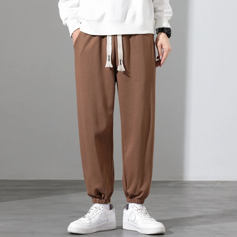 

Мужские повседневные брюки, осень 2024, новинка, однотонные длинные брюки с эластичной резинкой на талии, модные спортивные брюки, прямые брюки из полиэфирного волокна