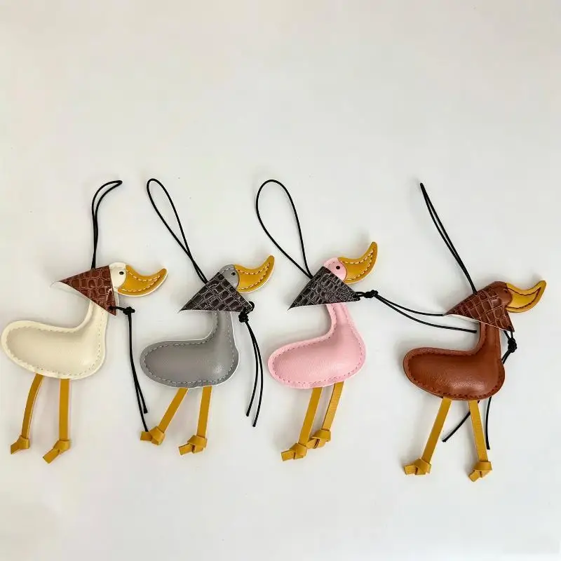 Kreativer Schal-Enten-Entenküken-Autoschlüsselanhänger aus PU-Leder, Taschenanhänger, Autoschlüsselanhänger-Dekoration – Detail 1
