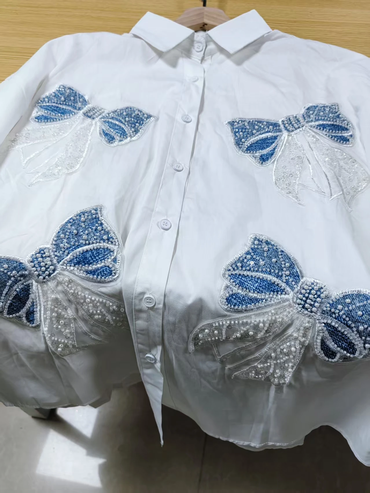 مشاعل مطرزة تصميم فاخر قمصان وبلوزات ملابس نسائية قمصان ملابس كورية شعبية أزرار حتى قميص نسائي طويل