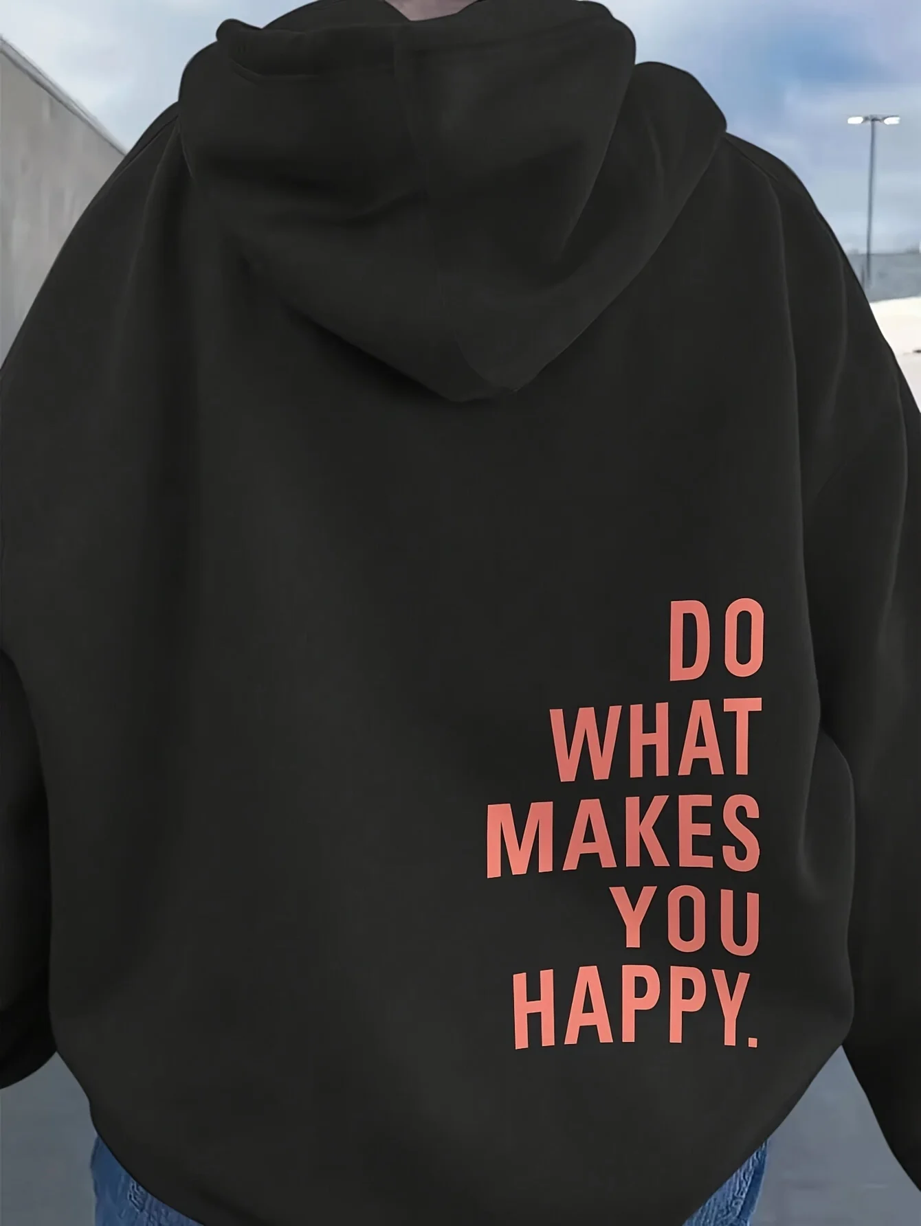 

Women's hooded sweatshirt with the slogan DO WHAT MAKES YOU HAPPY printed and adjustable drawstring hood pullover