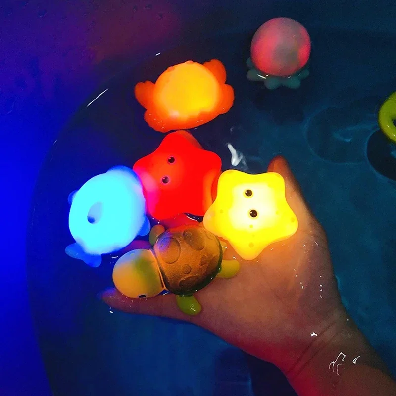 Children summer bathing vinyl toy Induction luminous animal floating water swimming LED light nets fishing baby Soft Rubber toys