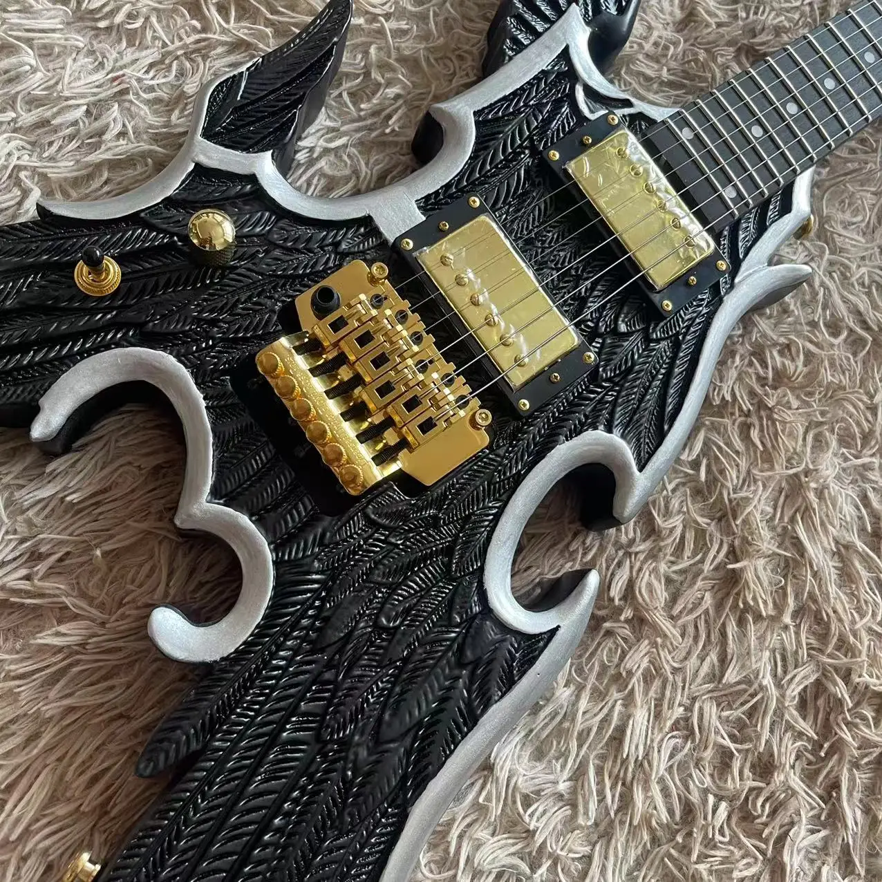 Guitar 6-string left-handed angel wing carved electric guitar, black body, gold accessories, factory real pictures, can be shipp